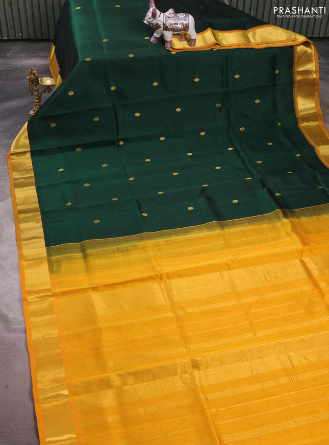 Silk cotton saree bottle green and mango yellow with zari woven buttas and zari woven border