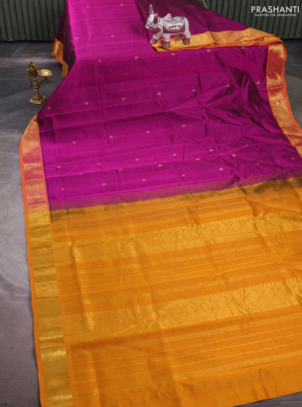 Silk cotton saree dark magenta and mustard yellow with zari woven buttas and zari woven border