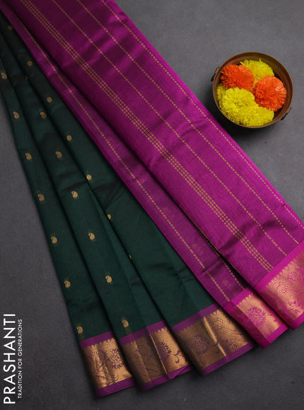 Silk cotton saree dual shade of bottle green and purple with zari woven buttas and peacock zari woven border