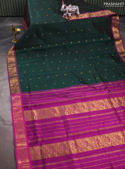 Silk cotton saree dual shade of bottle green and purple with zari woven buttas and peacock zari woven border