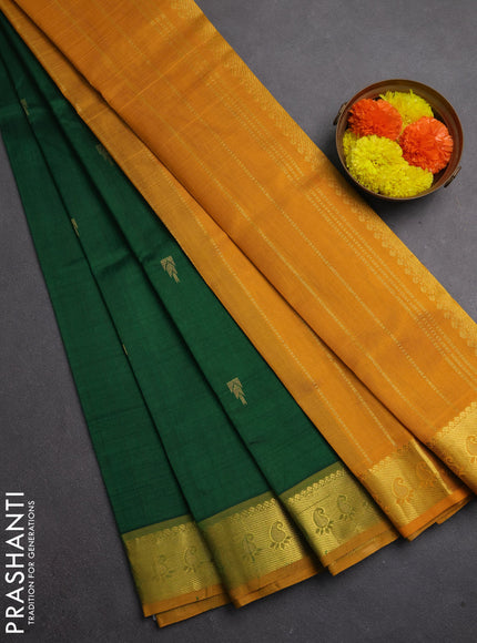 Silk cotton saree green and mango yellow wiith zari woven temple buttas and zari woven border