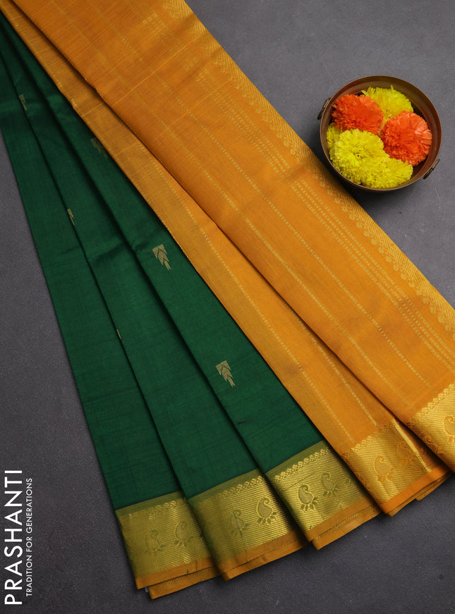 Silk cotton saree green and mango yellow wiith zari woven temple buttas and zari woven border