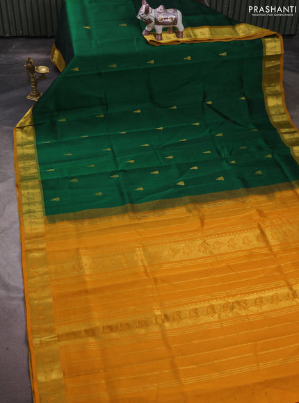 Silk cotton saree green and mango yellow wiith zari woven temple buttas and zari woven border