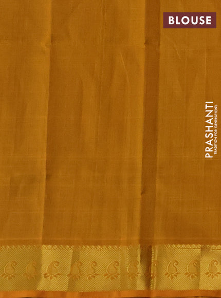Silk cotton saree green and mango yellow wiith zari woven temple buttas and zari woven border