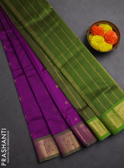 Silk cotton saree purple and mehendi green with allover zari woven buttas and elephant zari woven border