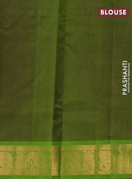 Silk cotton saree purple and mehendi green with allover zari woven buttas and elephant zari woven border