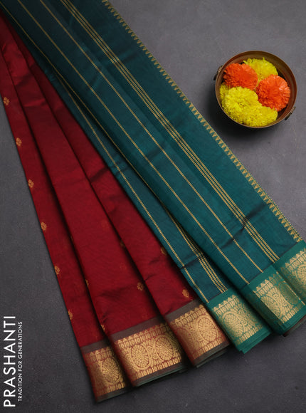 Silk cotton saree maroon and peacpck green with allover zari woven buttas and zari woven border