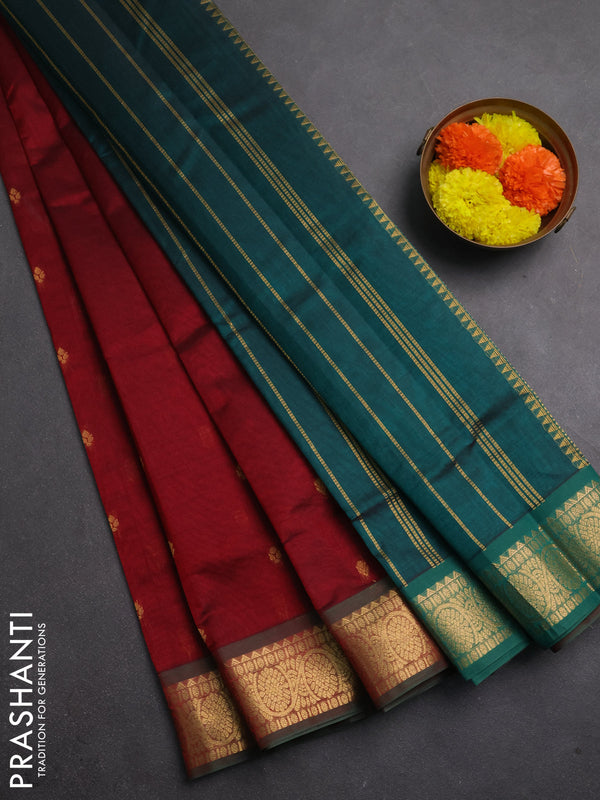 Silk cotton saree maroon and peacpck green with allover zari woven buttas and zari woven border