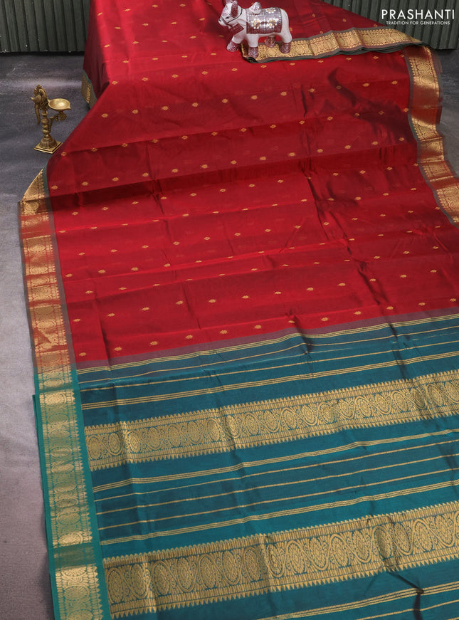 Silk cotton saree maroon and peacpck green with allover zari woven buttas and zari woven border