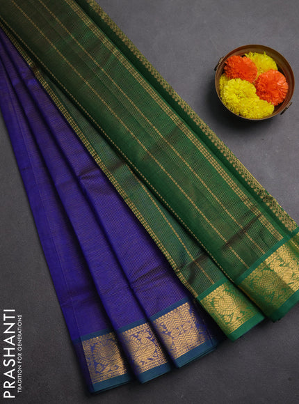 Silk cotton saree blue and green with allover vairaosi pattern and annam zari woven border