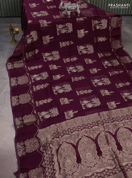 Silk kota saree wine shade with allover zari woven buttas and zari woven butta border