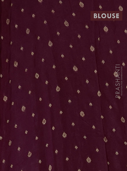 Silk kota saree wine shade with allover zari woven buttas and zari woven butta border