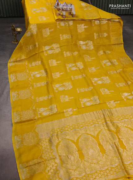Silk kota saree yellow with allover zari woven buttas and zari woven butta border