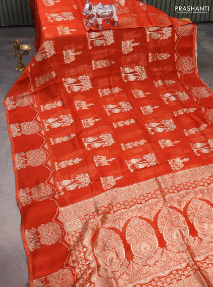Silk kota saree rustic orange with allover zari woven buttas and zari woven butta border