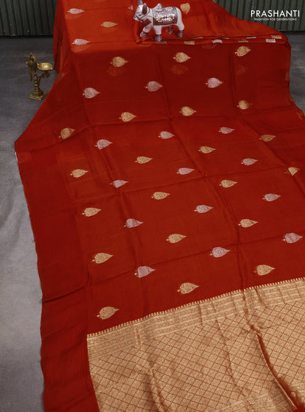 Silk kota saree rustic orange with allover silver & gold zari woven buttas and simple border
