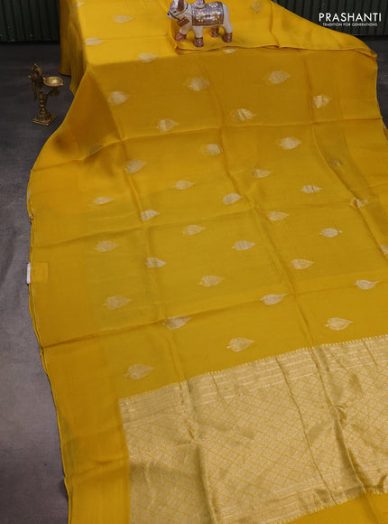 Silk kota saree yellow with allover silver zari woven buttas and simple border
