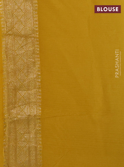 Silk kota saree yellow with allover silver zari woven buttas and simple border
