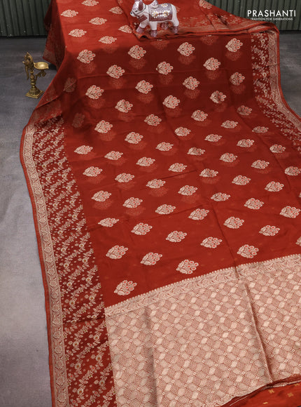 Silk kota saree rust shade with allover thread & zari woven floral buttas and zari woven border