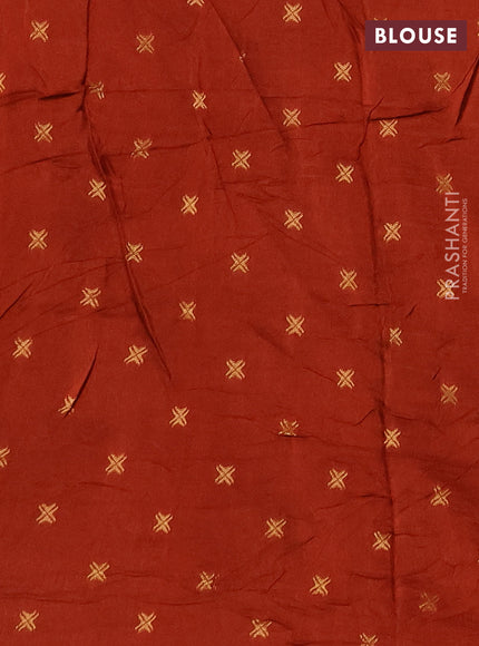 Silk kota saree rust shade with allover thread & zari woven floral buttas and zari woven border
