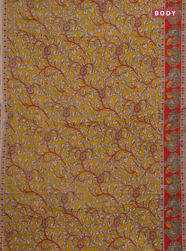 Kalamkari cotton saree mustard yellow and red with allover prints and printed border