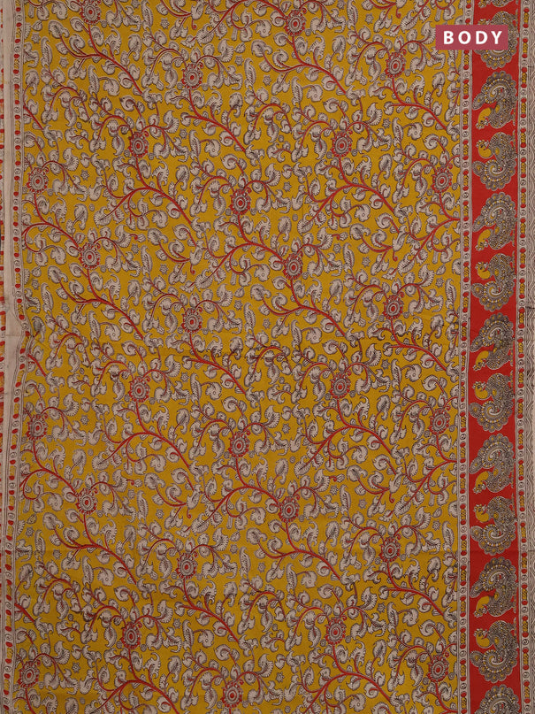 Kalamkari cotton saree mustard yellow and red with allover prints and printed border