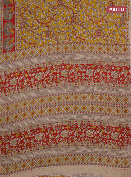 Kalamkari cotton saree mustard yellow and red with allover prints and printed border
