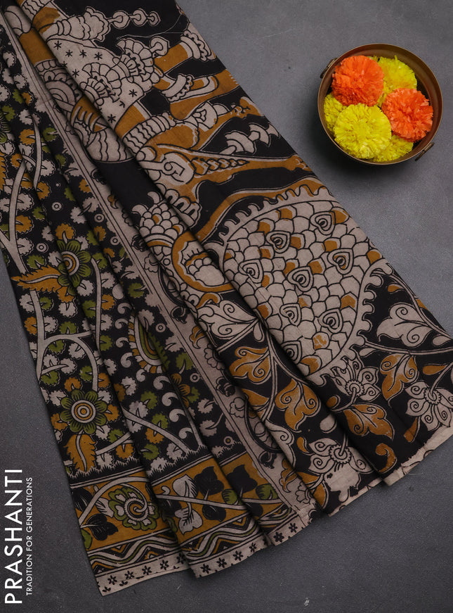 Kalamkari cotton saree black and mustard yellow with allover prints and printed border