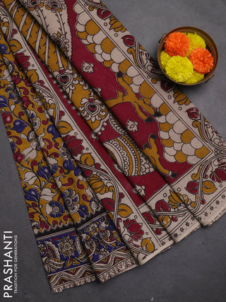 Kalamkari cotton saree mustard yellow and blue with allover prints and printed border