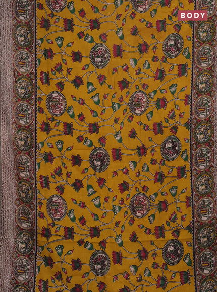 Kalamkari cotton saree mustard yellow and pink with allover prints and printed border