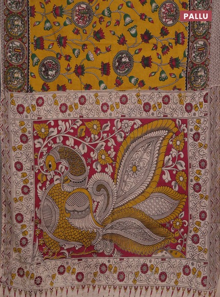Kalamkari cotton saree mustard yellow and pink with allover prints and printed border