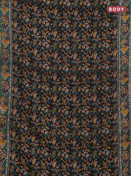 Kalamkari cotton saree black and teal green with allover prints and printed border