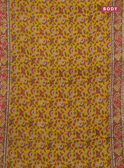 Kalamkari cotton saree light green and dark mustard with allover prints and printed border