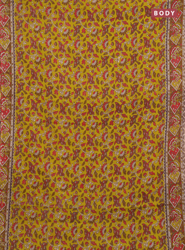 Kalamkari cotton saree light green and dark mustard with allover prints and printed border