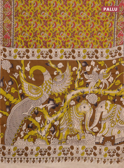 Kalamkari cotton saree light green and dark mustard with allover prints and printed border