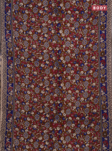 Kalamkari cotton saree dark mustard and blue with allover prints and printed border