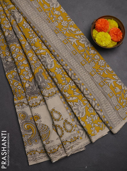 Kalamkari cotton saree mustard yellow and beige with allover prints and long printed border