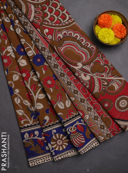 Kalamkari cotton saree dark mustard and blue with allover prints and printed border