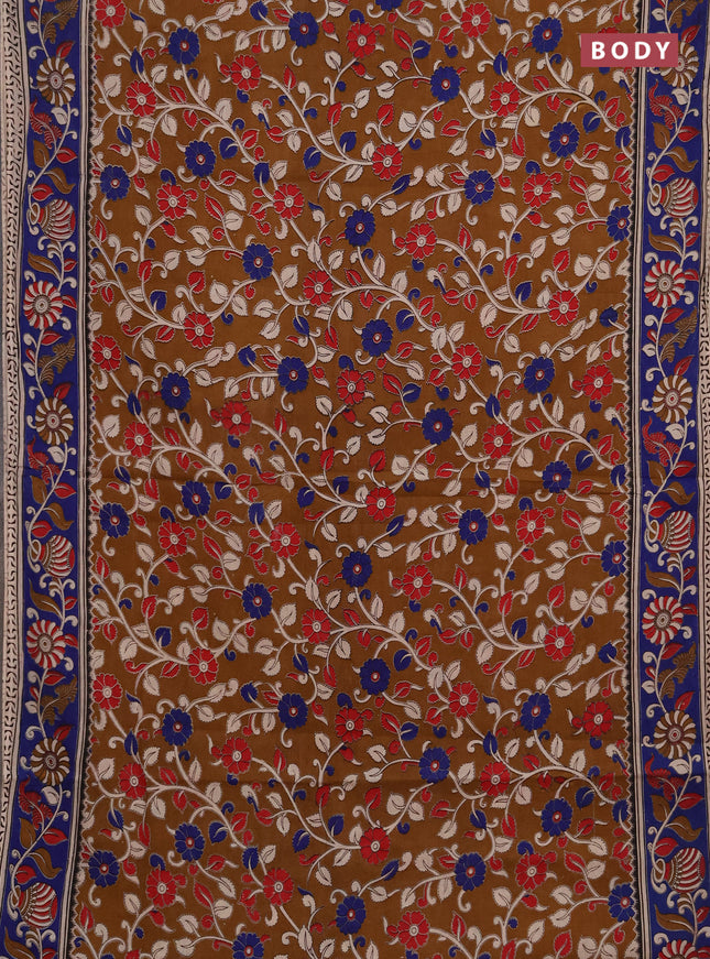 Kalamkari cotton saree dark mustard and blue with allover prints and printed border