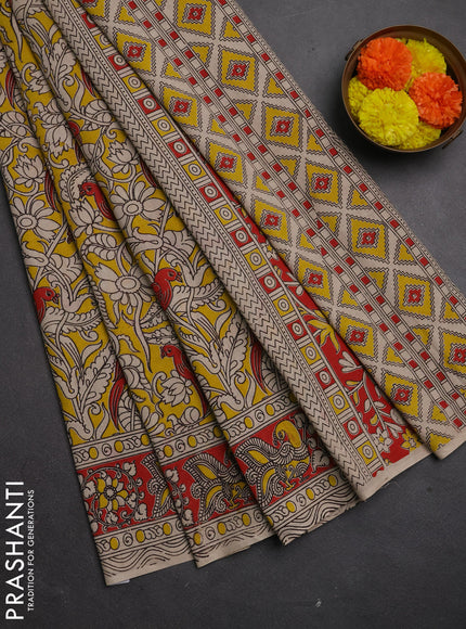 Kalamkari cotton saree yellow and red with allover prints and printed border
