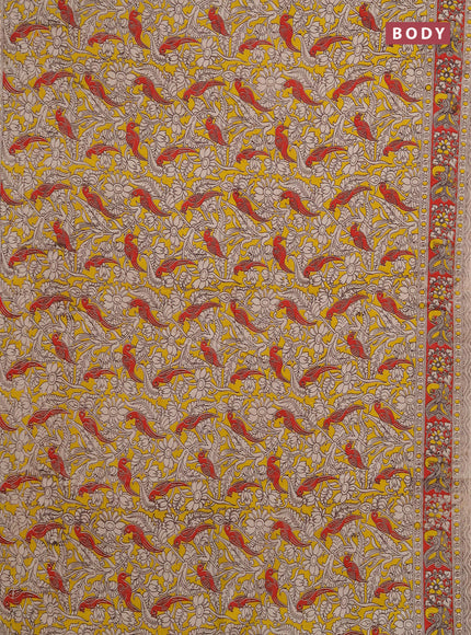 Kalamkari cotton saree yellow and red with allover prints and printed border