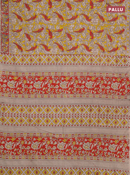 Kalamkari cotton saree yellow and red with allover prints and printed border