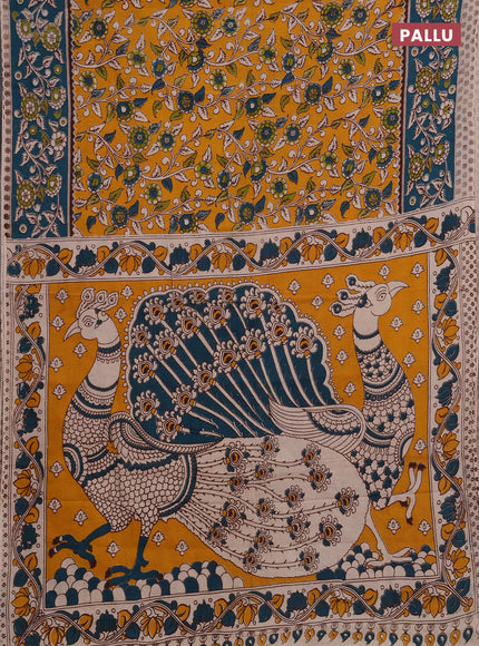 Kalamkari cotton saree mustard yellow and peacock green with allover prints and printed border