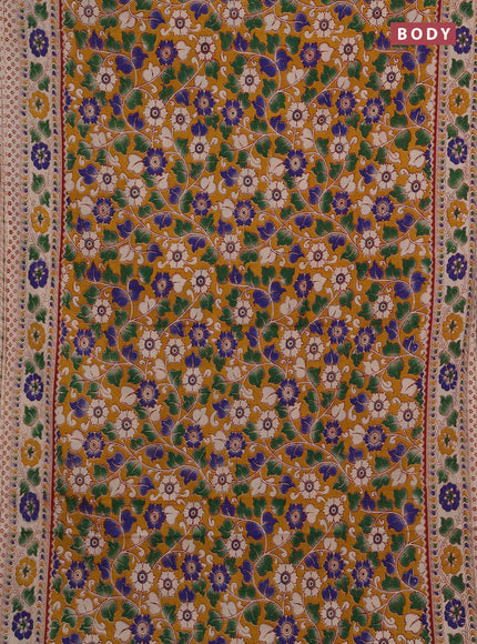 Kalamkari cotton saree mustard yellow and beige with allover prints and printed border