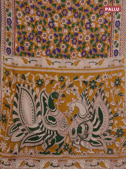 Kalamkari cotton saree mustard yellow and beige with allover prints and printed border
