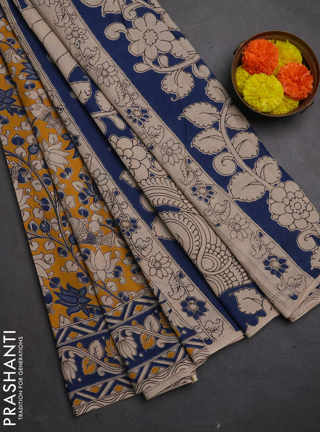 Kalamkari cotton saree mustard yellow and peacock blue with allover prints and printed border