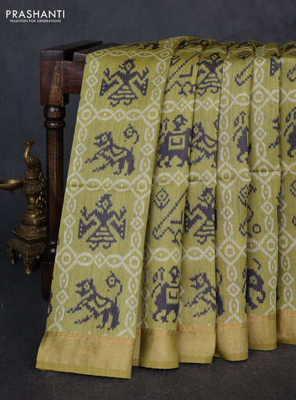 Munga tussar silk saree mustard green with allover patola prints and zari woven border