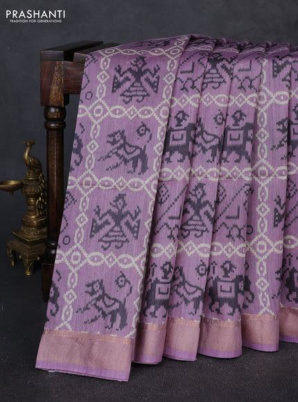 Munga tussar silk saree lavender with allover patola prints and zari woven border