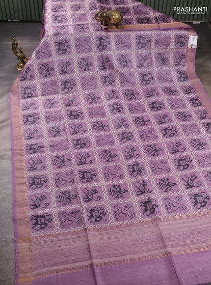 Munga tussar silk saree lavender with allover patola prints and zari woven border