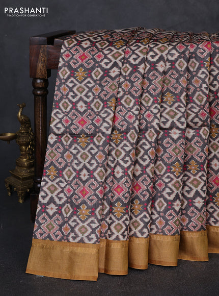 Munga tussar silk saree grey and mustard yellow with allover ikat prints and zari woven border