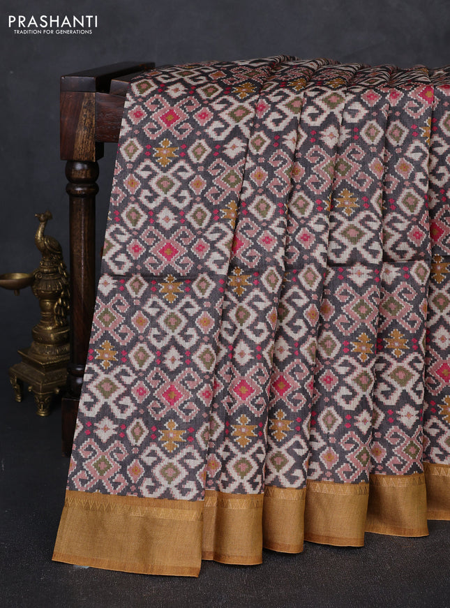 Munga tussar silk saree grey and mustard yellow with allover ikat prints and zari woven border